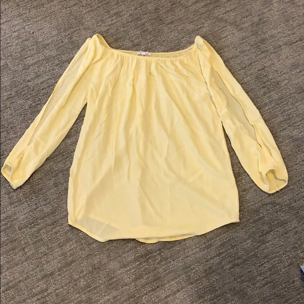 Long sleeve off the shoulder shirt.